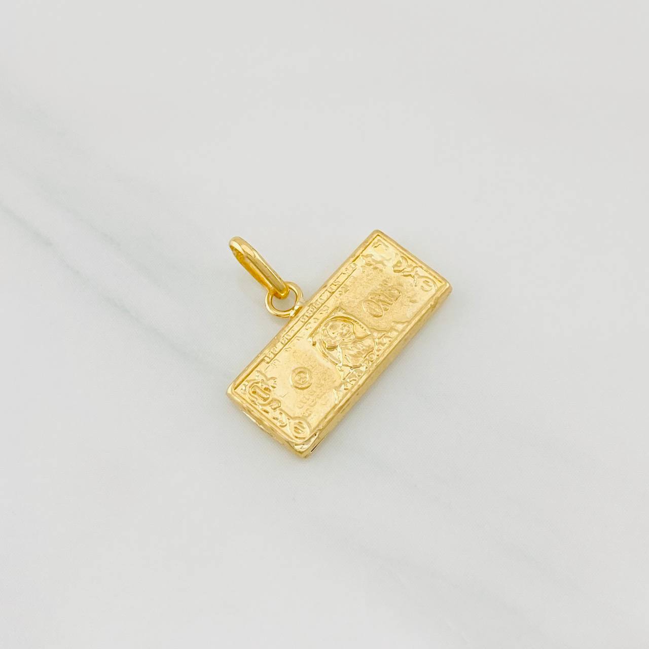 Dije One Dolar 0.65g / 1/2 in Oro Amarillo 18K