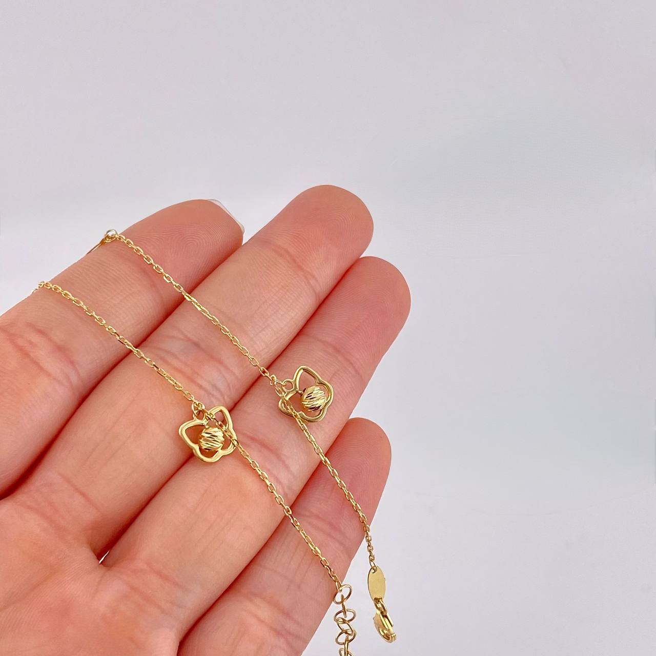 Tobillera Aro Seguido Mariposa Bola Central 2.7g / 9 3/4 in / 1mm Oro Amarillo 18K