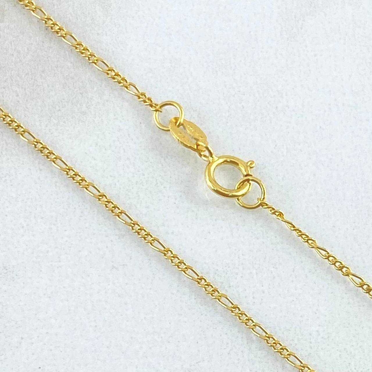 Cadena Figaro 2.25gr / 23 1/2 in / 1.1mm Oro Amarillo +1 18K *