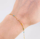 Pulso Modulable Aro Seguido Chispas Arcoiris 1.05g / 6 1/2 in - 5 3/4 in / 1.3mm Oro Amarillo 18K
