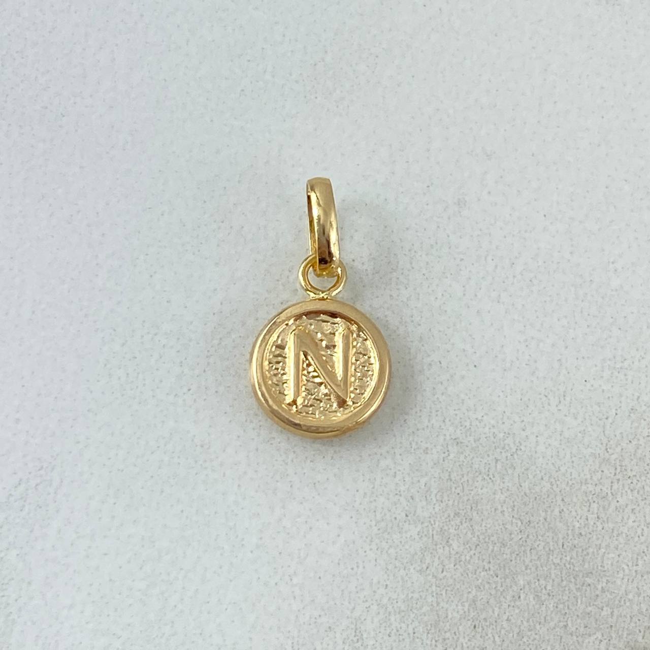Dije Letra N 0.4gr / 1.5cm / Circular Texturizado Oro Amarillo ©