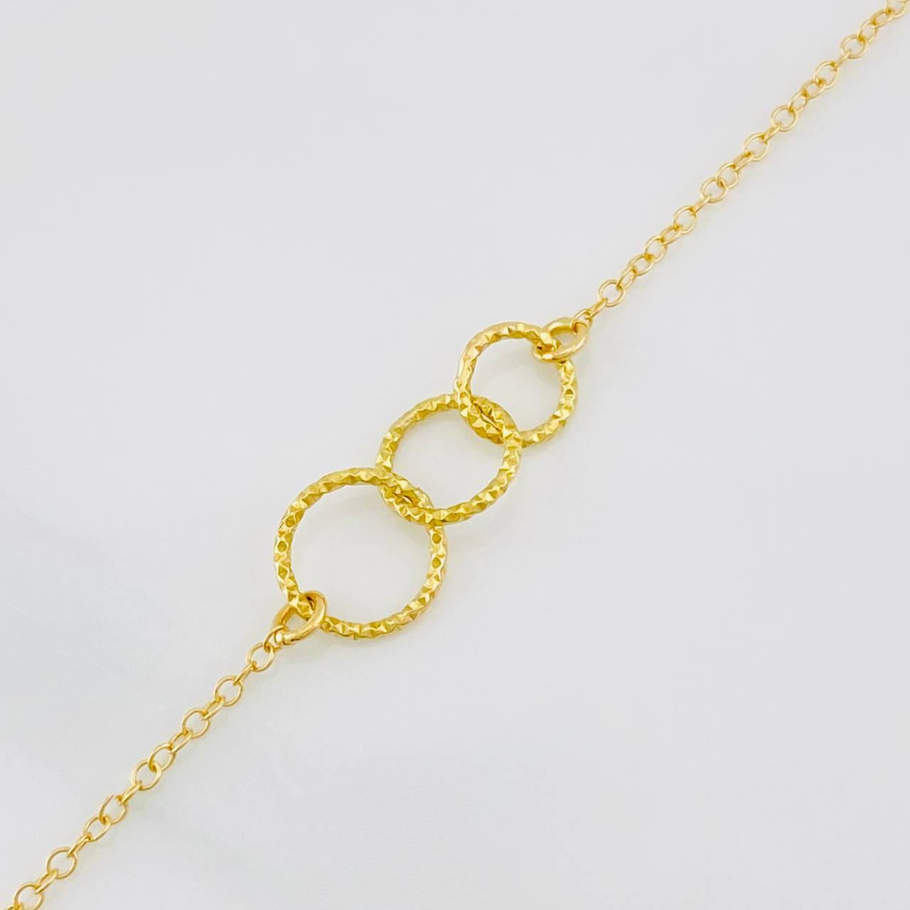 Pulso Modulable Aro Seguido Circulos Rayados 1.3g / 7 in - 6 1/4 in / 1.35mm Oro Amarillo 18K