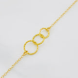 Pulso Modulable Aro Seguido Circulos Rayados 1.3g / 7 in - 6 1/4 in / 1.35mm Oro Amarillo 18K