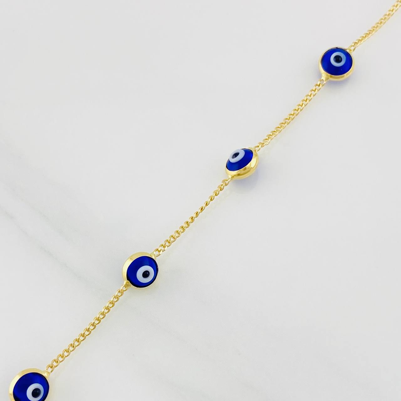 Pulso Cubano Ojos Turcos 2.25g / 7 3/4 in / 1.03mm Oro Amarillo 18K