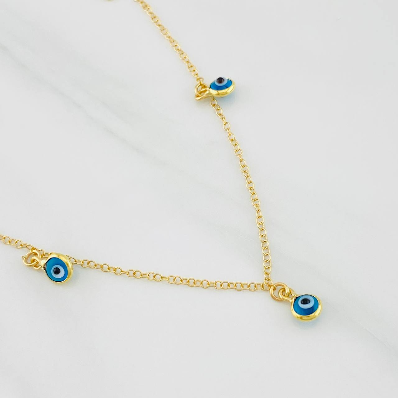 Cadena Aro Seguido Ojos Turcos 2g / 16 in / 1.36mm Oro Amarillo 18K