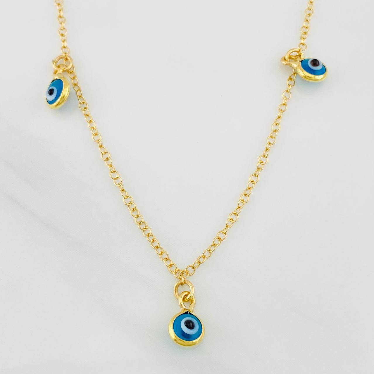 Cadena Aro Seguido Ojos Turcos 2g / 16 in / 1.36mm Oro Amarillo 18K