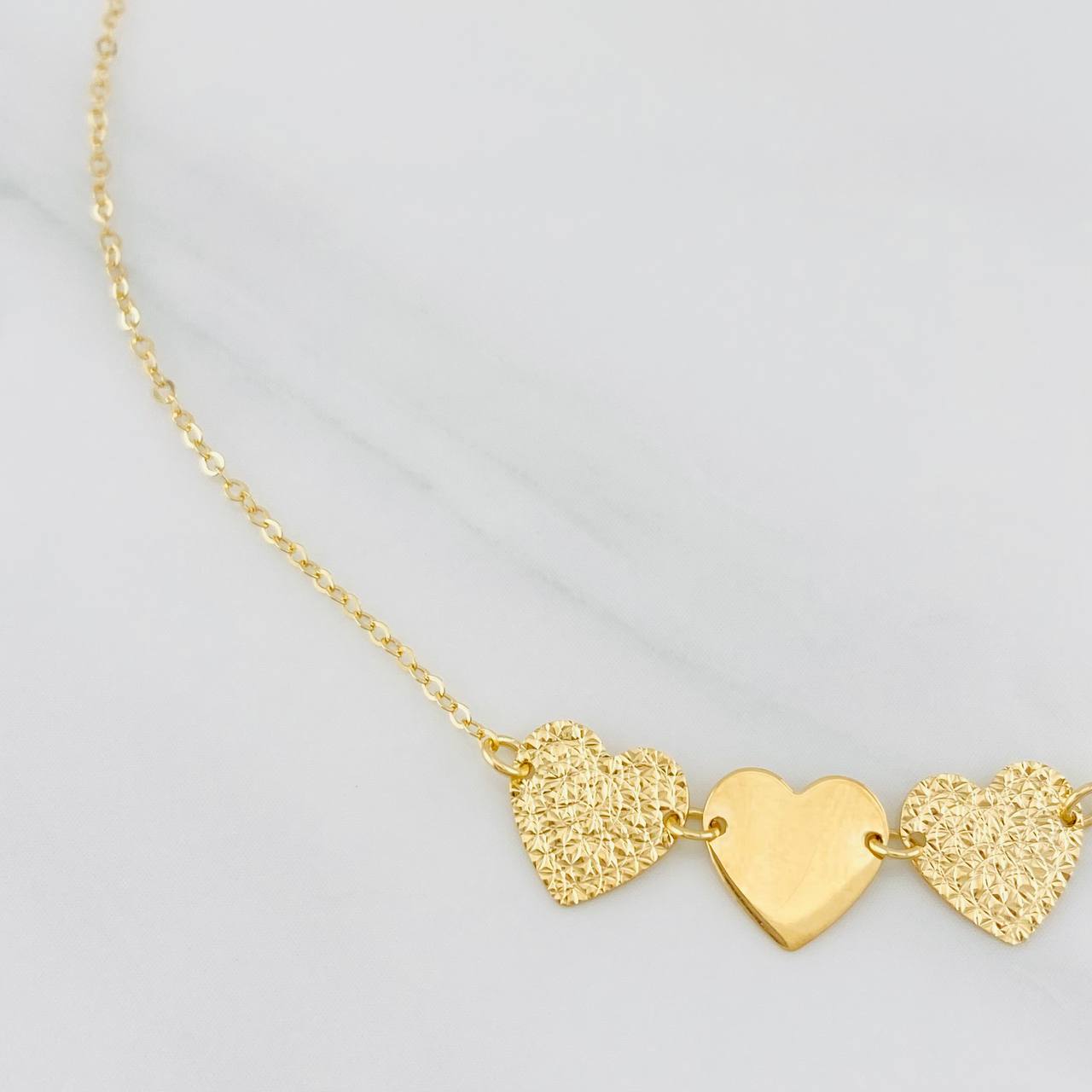 Pulso Modulable Aro Seguido Corazones 1.1g / 7 1/4 in - 6 1/2 in / 1.13mm Oro Amarillo 18K