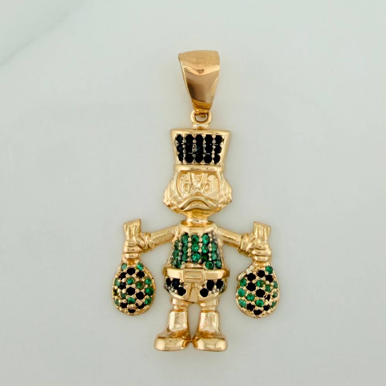Dije Pato Bolsa de Dinero 4.35gr / 1 1/2 in / Oro Amarillo 18K $