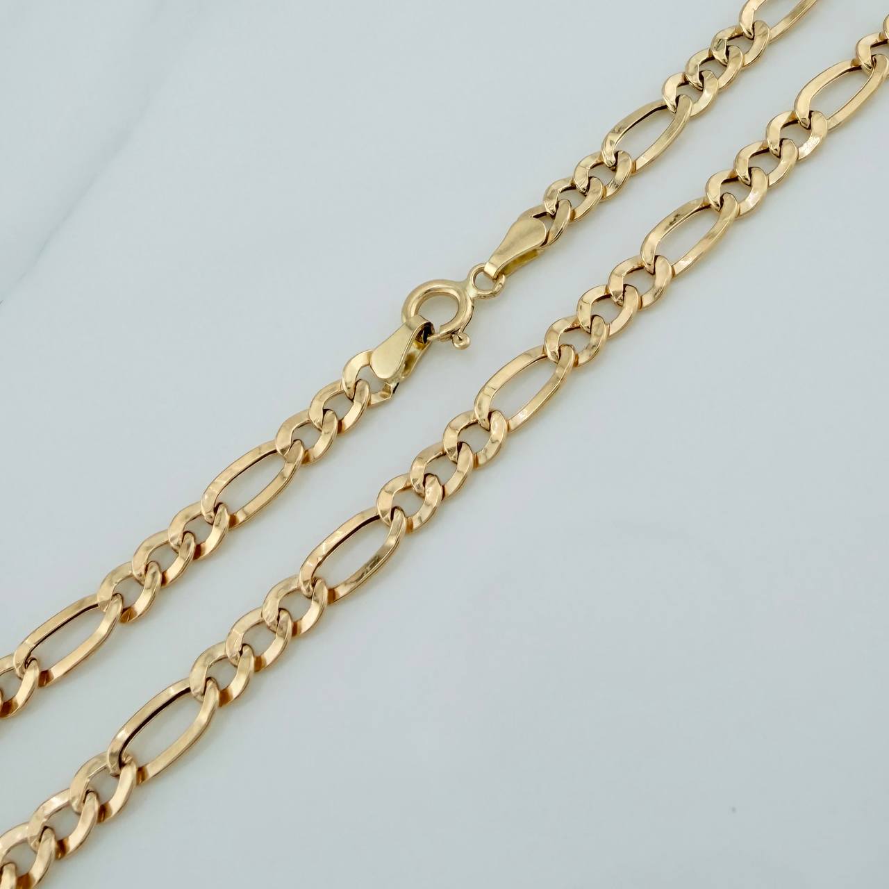 Cadena Figaro 7.5gr / 28 1/4 in / 4.14mm Oro Amarillo +1 18K $