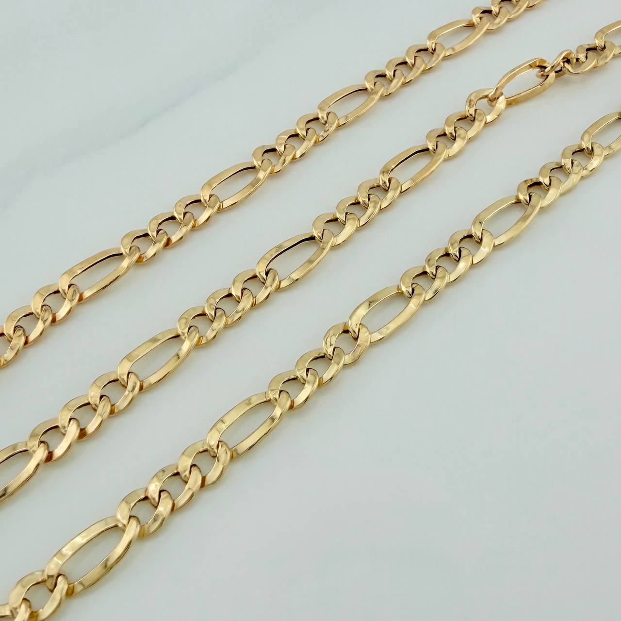 Cadena Figaro 7.5gr / 28 1/4 in / 4.14mm Oro Amarillo +1 18K $