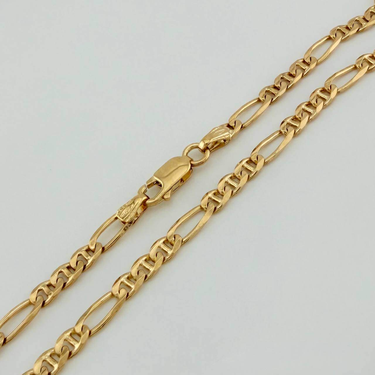 Cadena Figaro 18.6gr / 24 1/4 in / 3.7mm Oro Amarillo +1 18K $