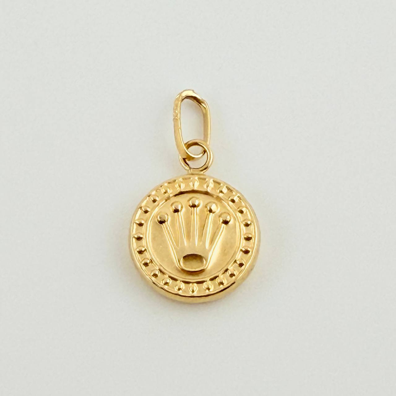 Dije Corona RX 0.5gr / 1/2 in / Oro Amarillo 18K ©