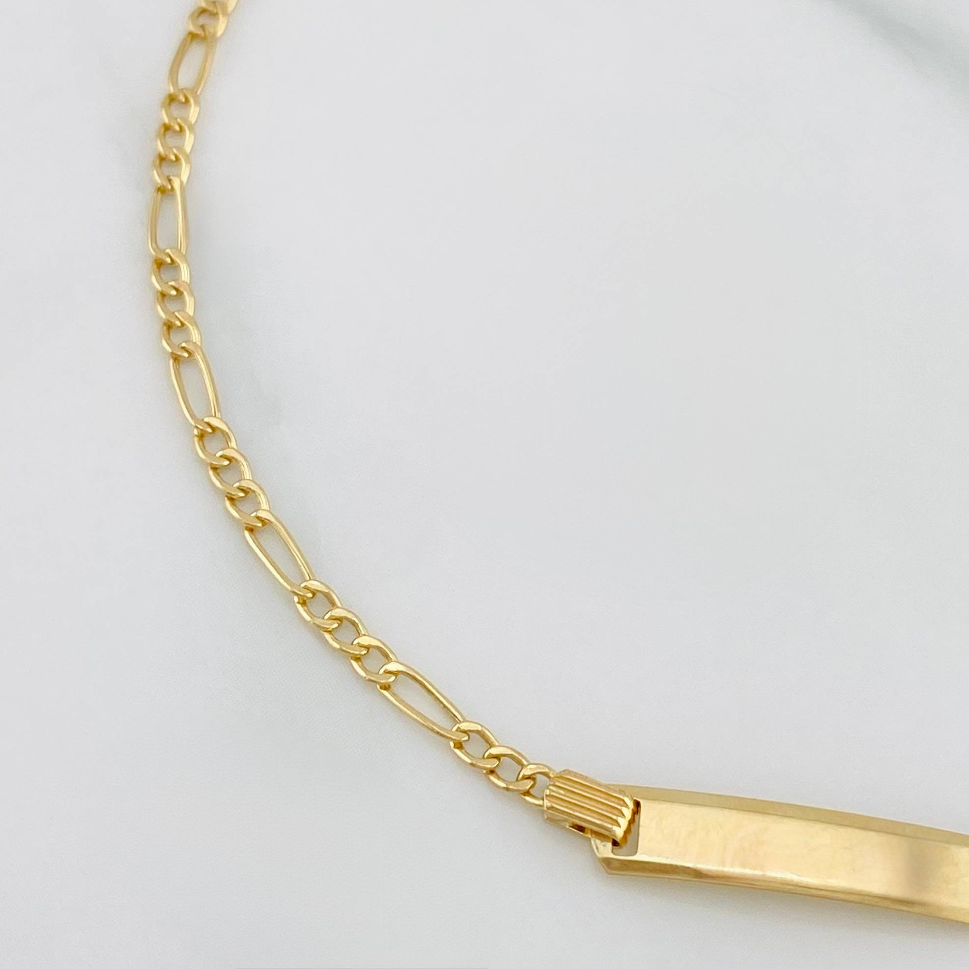 Pulso Fígaro Placa Rectangular 1.55 g / 6 1/2 in / 1.91 mm Oro Amarillo 18K