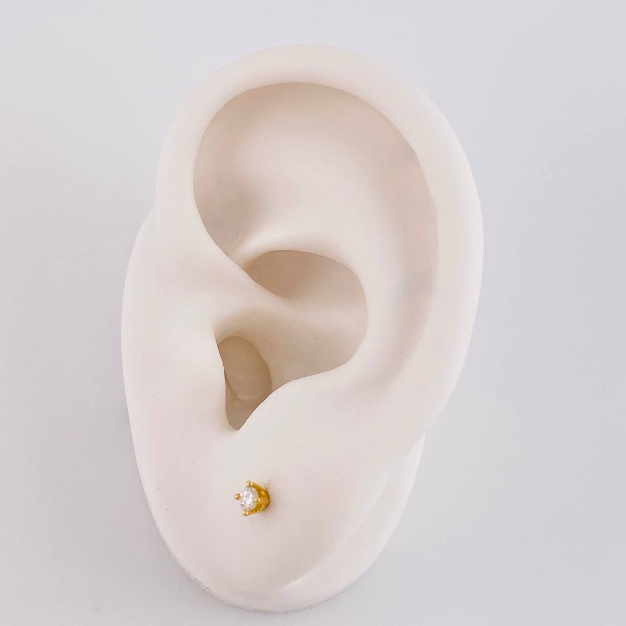 Topos Cuatro Garras Diamantes 12pts 0.7g / in / 2.7mm Oro Amarillo 18K