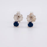 Topos Cuatro Garras Zafiros 12pts 0.7g / in / 2.7mm Oro Blanco 18K