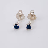 Topos Cuatro Garras Zafiros 12pts 0.7g / in / 2.7mm Oro Blanco 18K