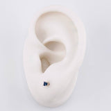 Topos Cuatro Garras Zafiros 12pts 0.7g / in / 2.7mm Oro Blanco 18K