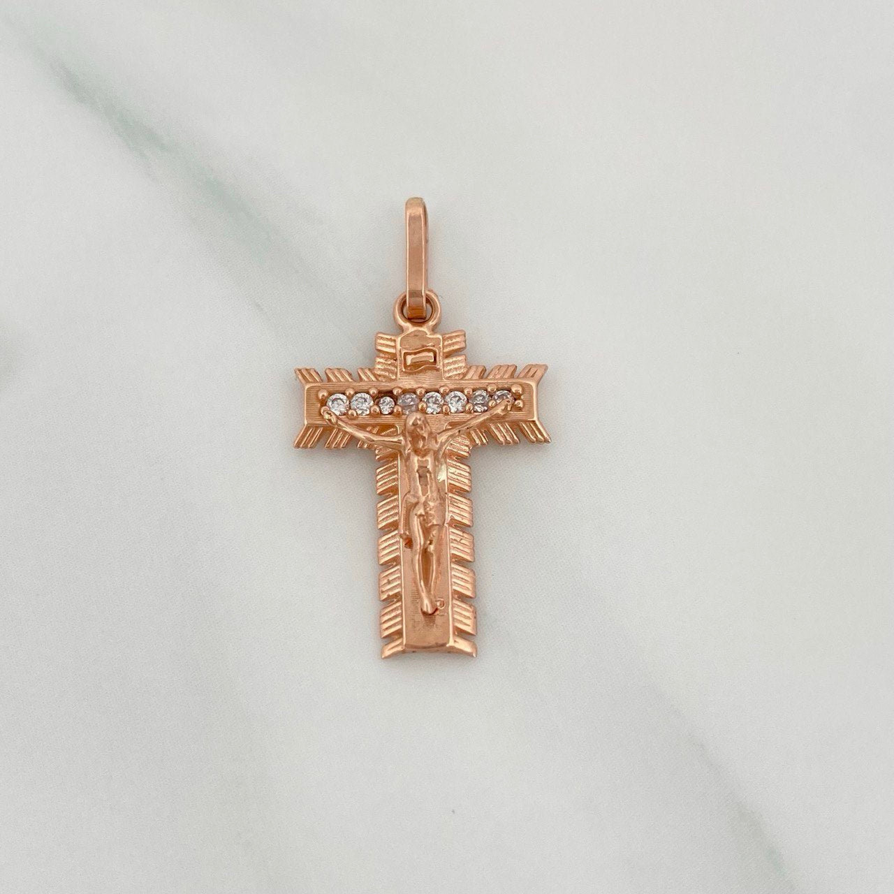 Dije Cruz 2.1gr / 1 in / Oro Rosa 18K &