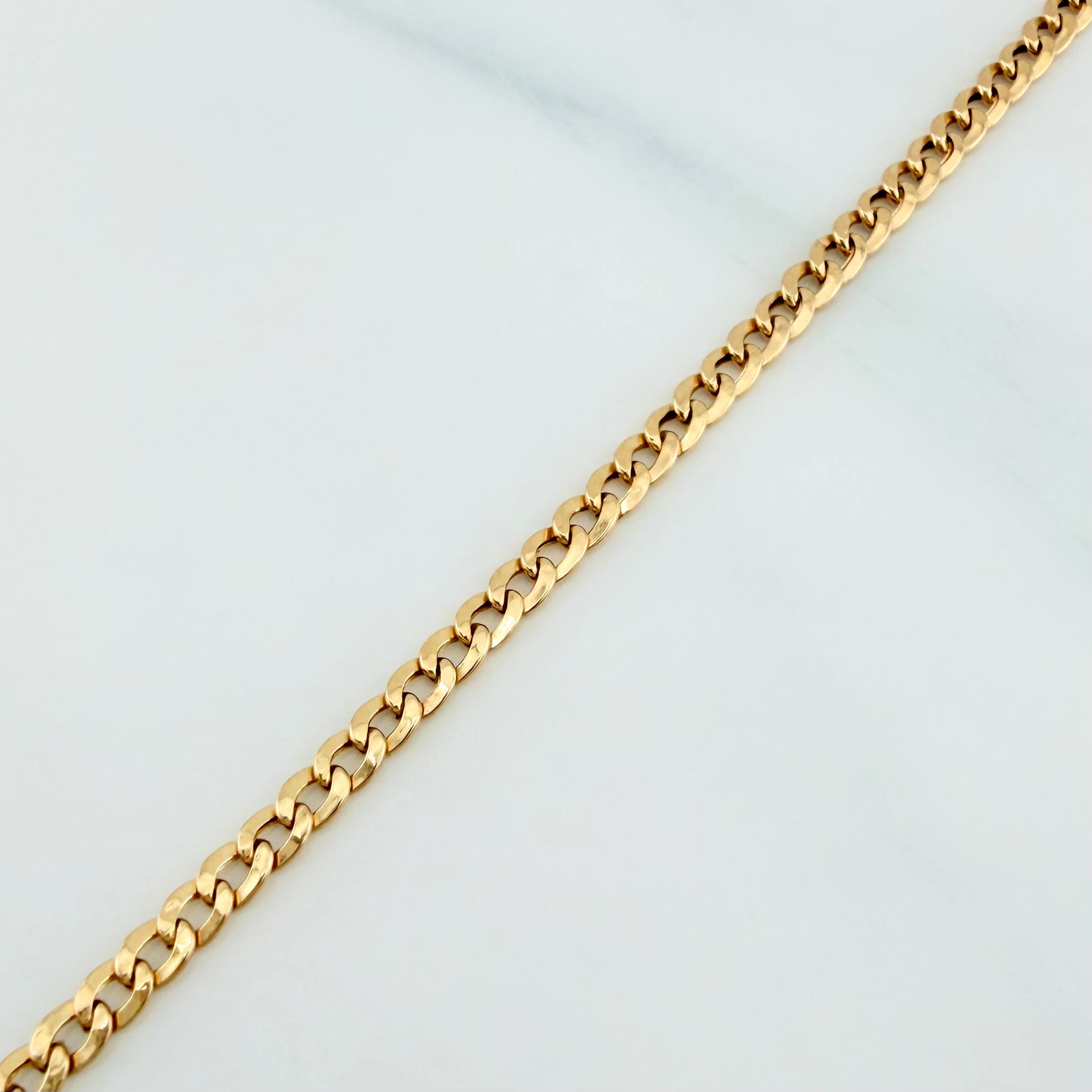 Pulso Cubano 1.25 g / 8 1/4 in / 2.5 mm Oro Amarillo 18K