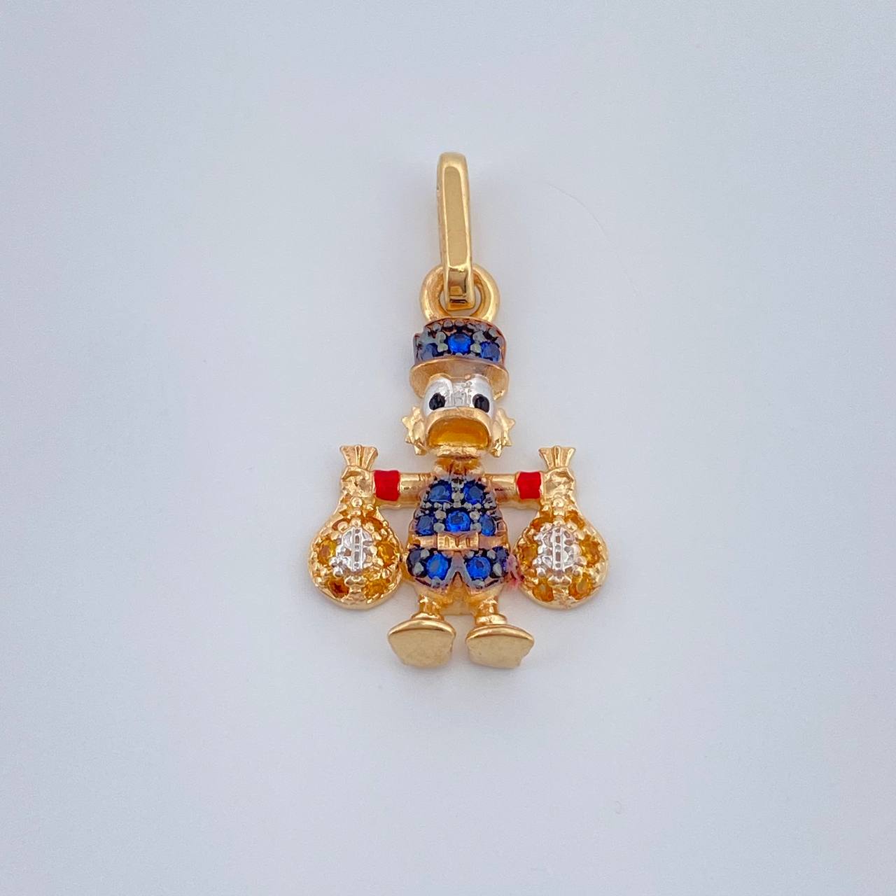 Dije Pato Bolsa Dinero 1.6gr / 3/4 in / Tres Oros 18K %