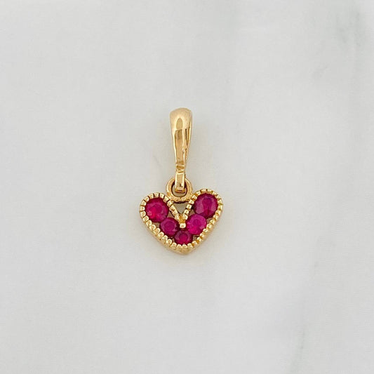 Dije Corazon Rubíes 0.27pts 0.6g / 1/2 in Oro Amarillo 18K