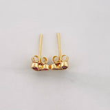 Topos Corazon Rubíes 0.54pts 1.15g / in / 7.11mm Oro Amarillo 18K