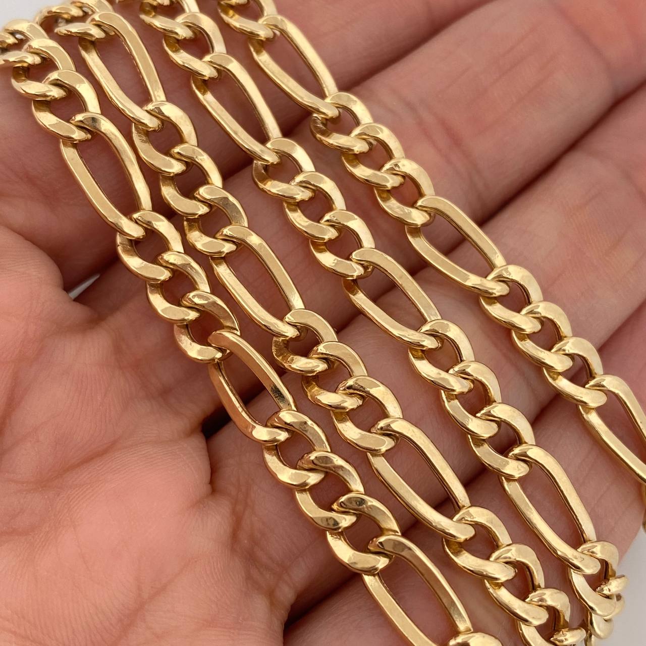 Cadena Figaro 19.45gr / 24 in / 5.04mm Oro Amarillo +1 18K $