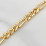Cadena Figaro 19.45gr / 24 in / 5.04mm Oro Amarillo +1 18K $