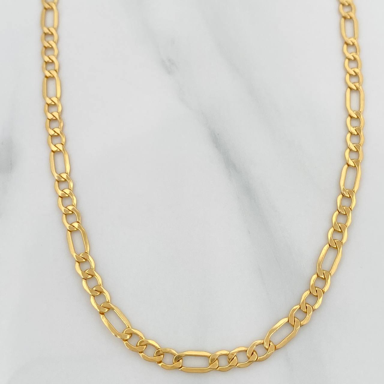 Cadena Figaro 5.9gr / 25 1/2 in / 3.4mm Oro Amarillo +1 18K $