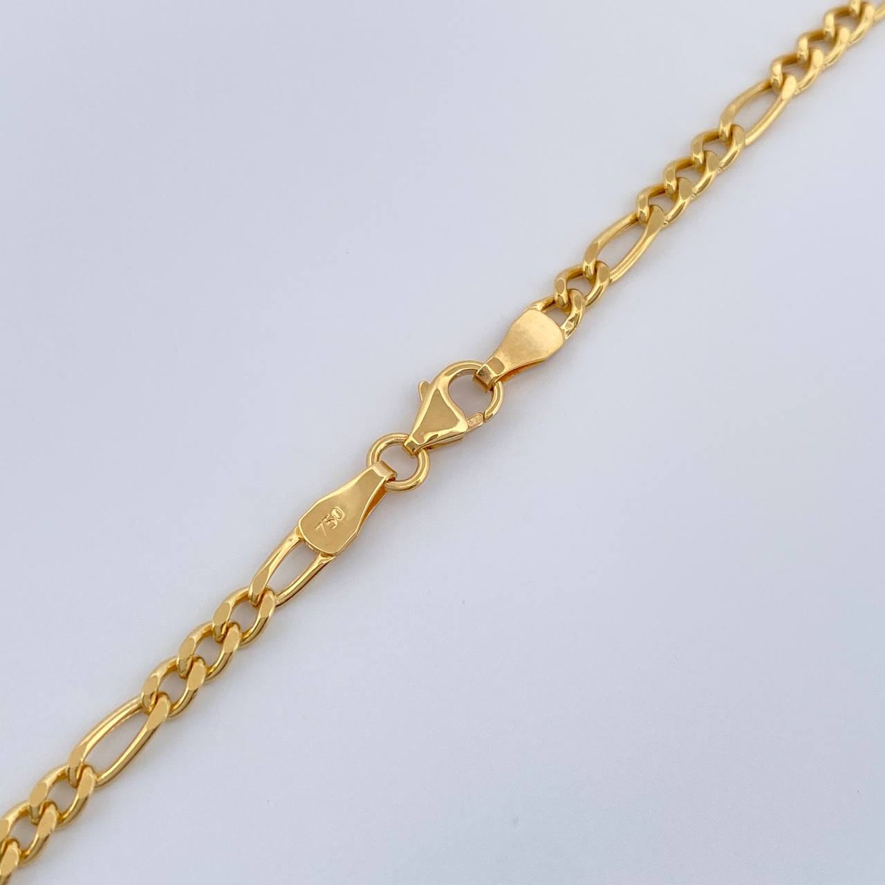 Cadena Figaro 6.5gr / 23 3/4 in / 2.93mm Oro Amarillo +1 18K $