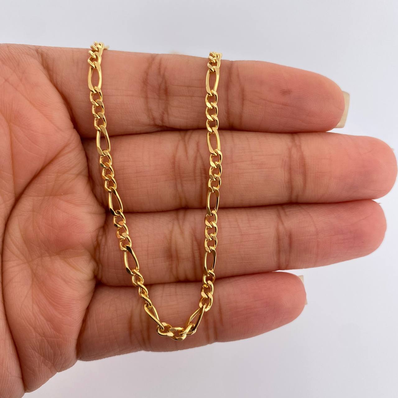 Cadena Figaro 6.5gr / 23 3/4 in / 2.93mm Oro Amarillo +1 18K $