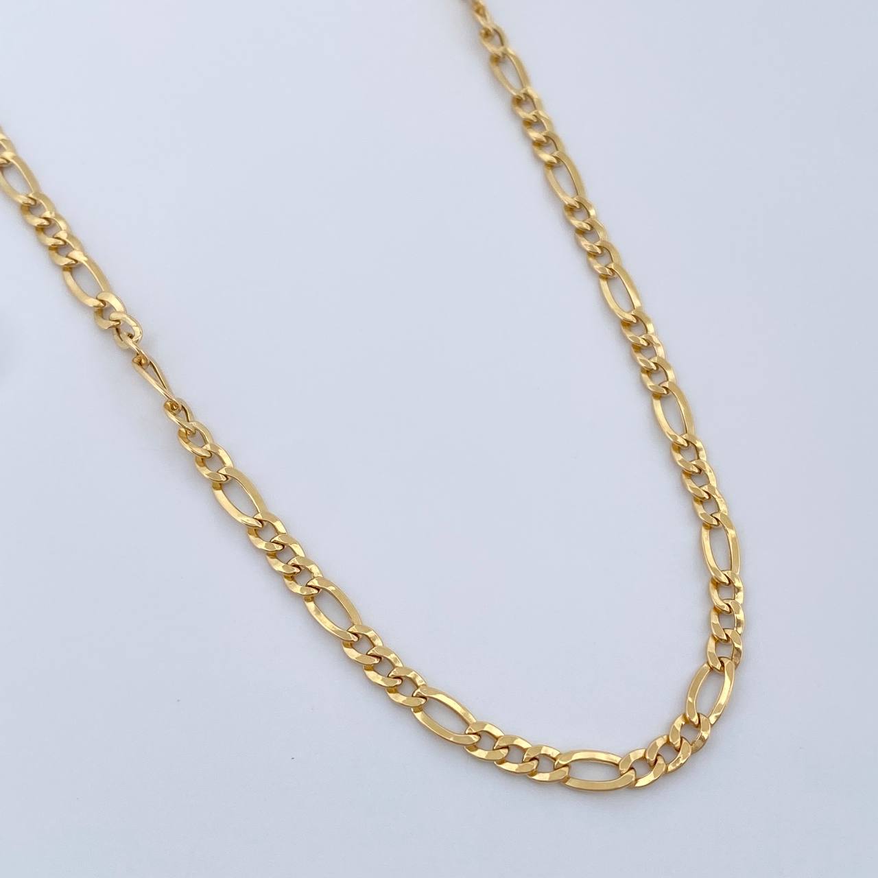 Cadena Figaro 6.5gr / 23 3/4 in / 2.93mm Oro Amarillo +1 18K $