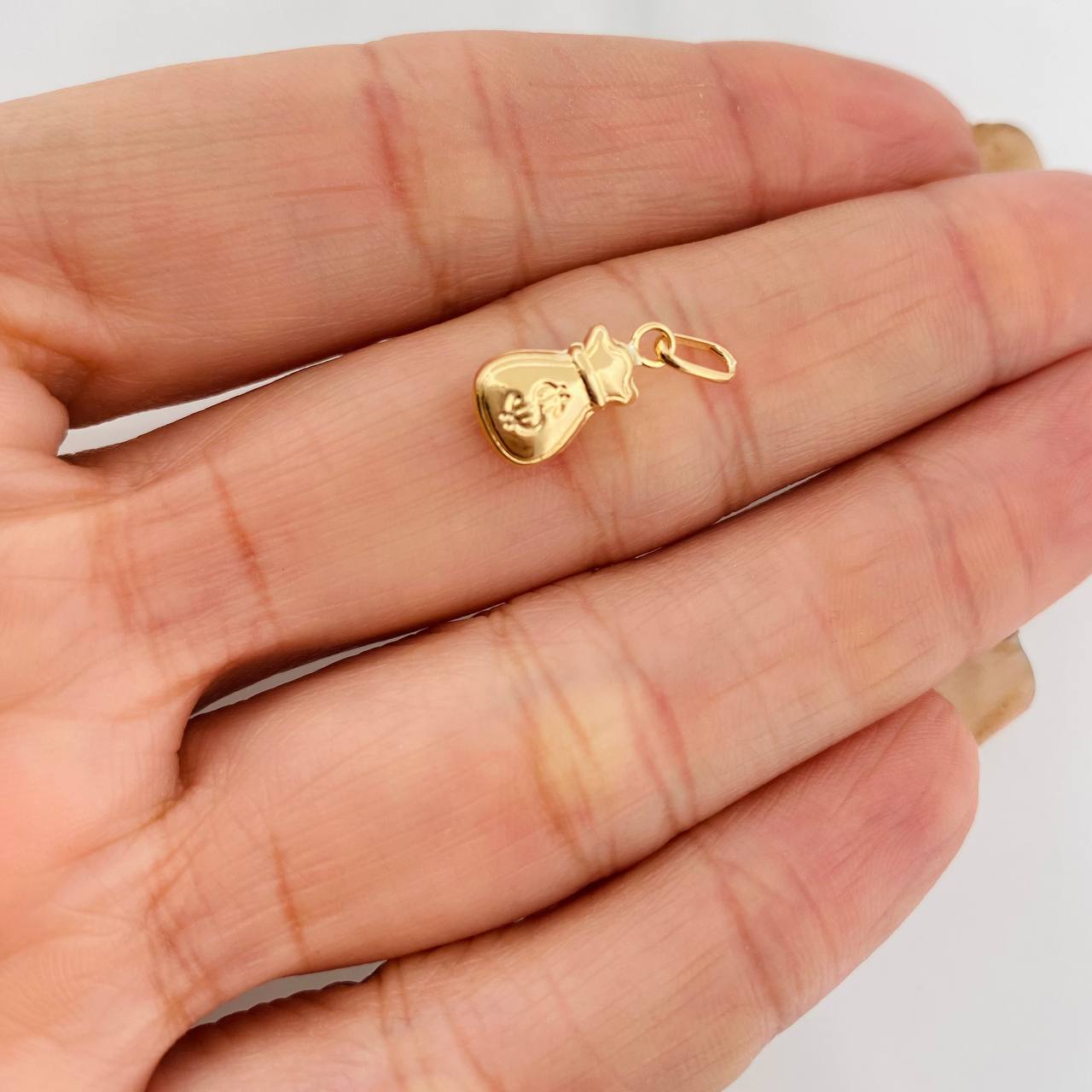 Dije Bolsa de Dinero 0.35g / 1/2 in Oro Amarillo 18K