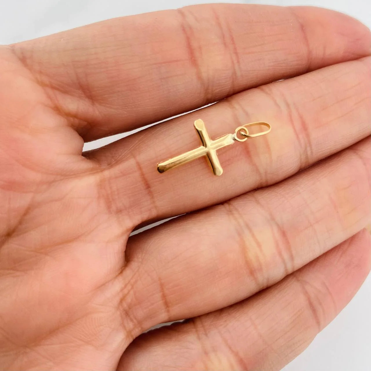 Dije Cruz 0.4g / 1 in Oro Amarillo 18K