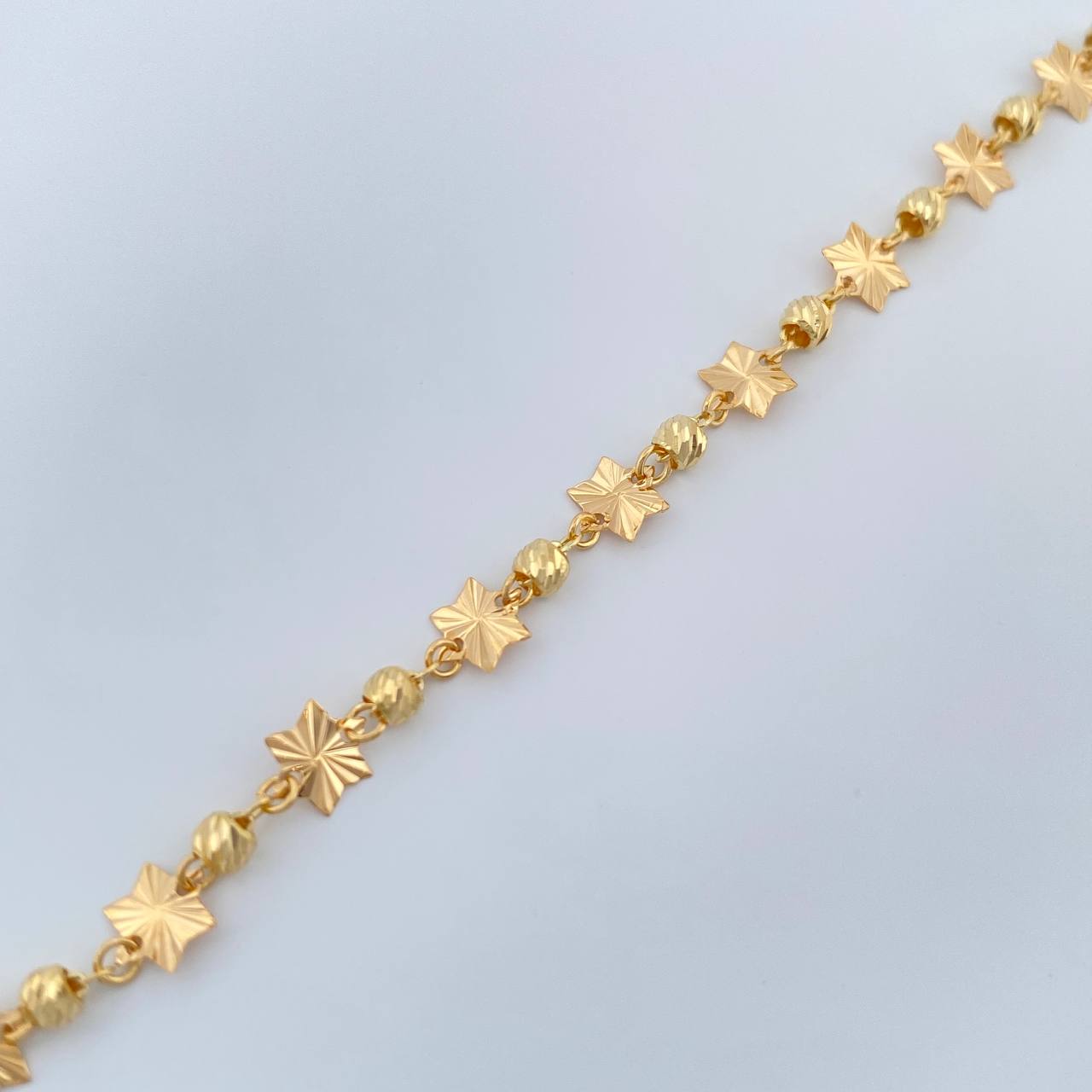 Pulso Estrellas Diamantadas 2.4gr / 7 1/2 in / 3mm Oro Amarillo 18K %