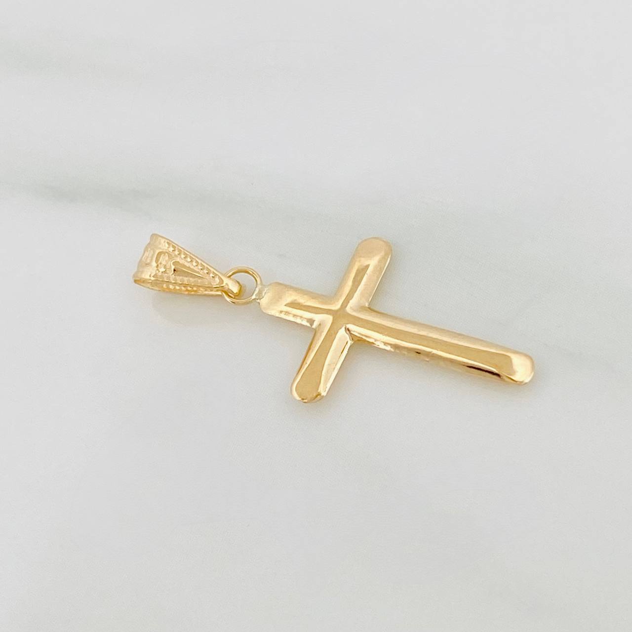 Dije Cruz 0.6gr / 1 in / Oro Amarillo 18K &