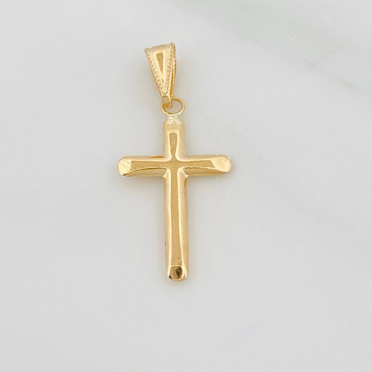 Dije Cruz 0.6gr / 1 in / Oro Amarillo 18K &