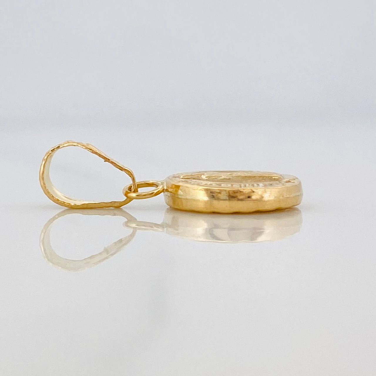 Dije San Benito 0.65gr / 2cm / Oro Amarillo 18K %