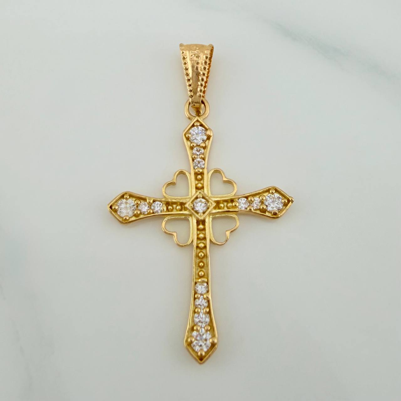 Dije Cruz Corazones 1.3gr / 1 1/4 in / Oro Amarillo 18K $