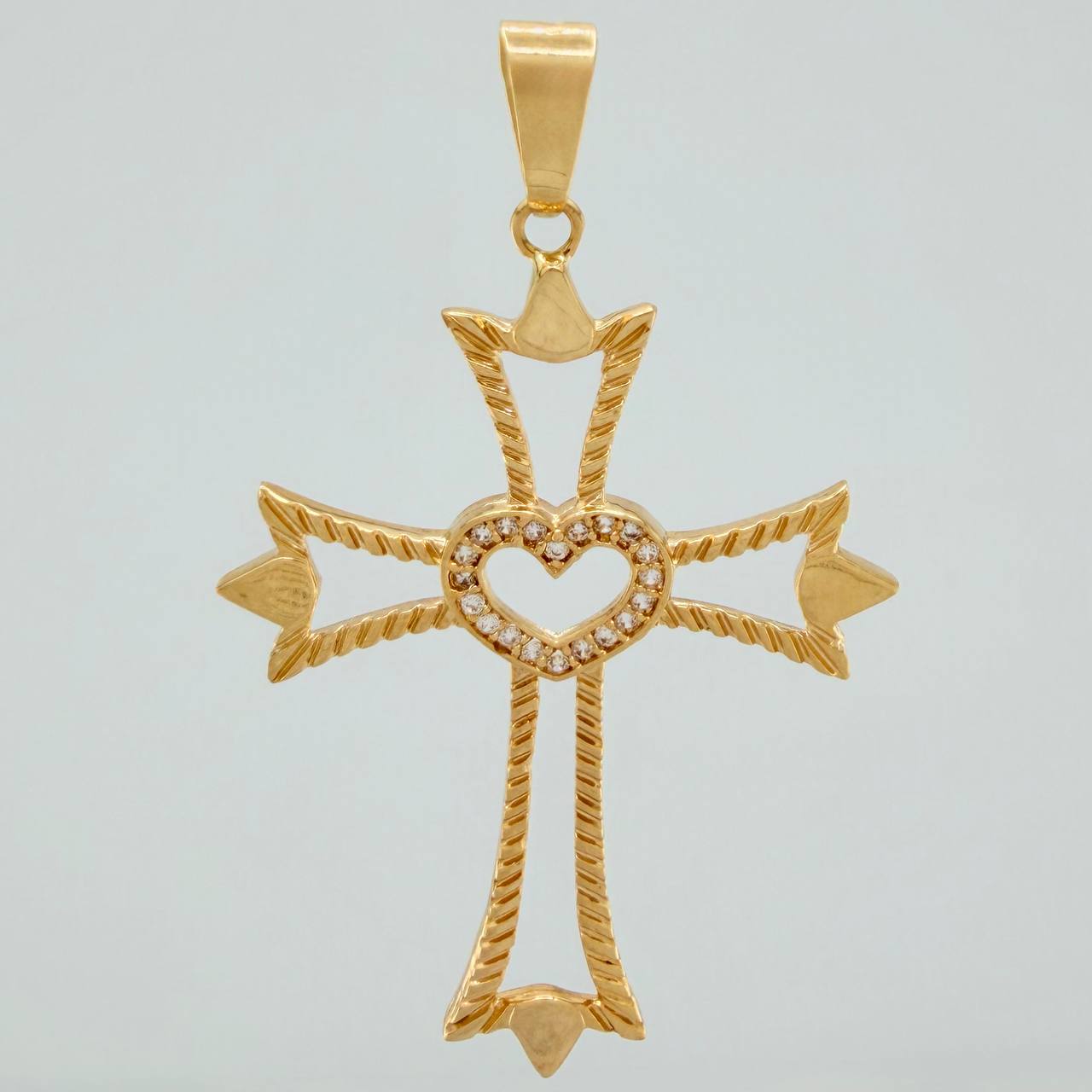 Dije Silueta Cruz Corazon 3.1gr / 2 in / Oro Amarillo 18K $