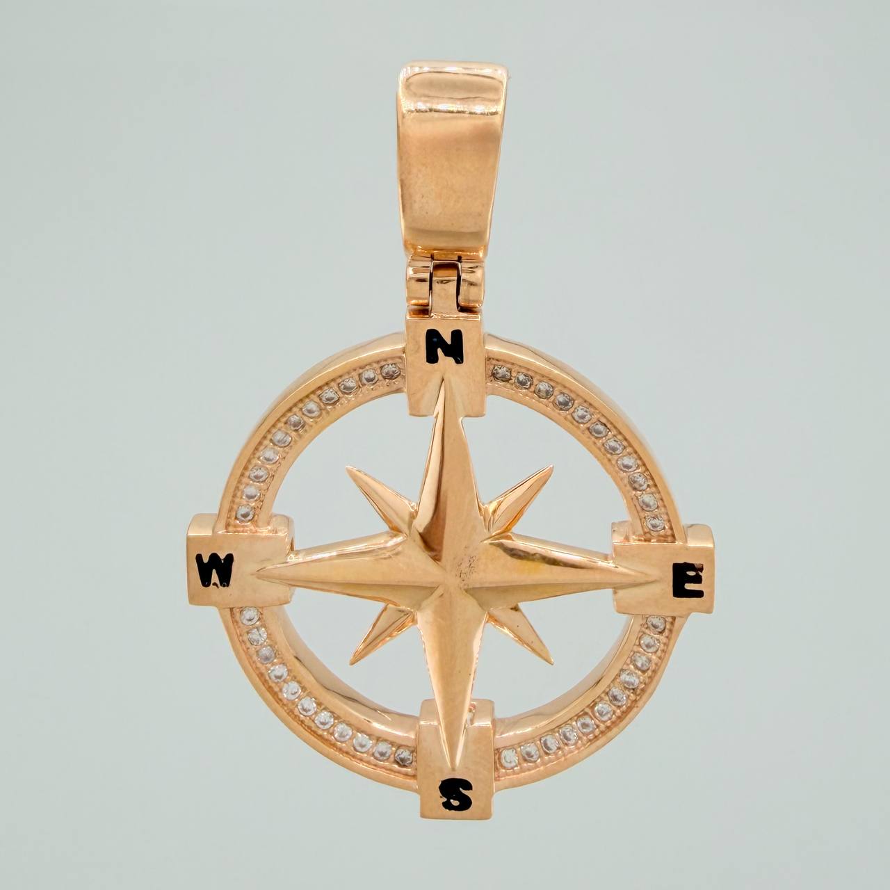 Dije Estrella Cardinal 7.65gr / 1 1/2 in / Oro Rosa 18K $