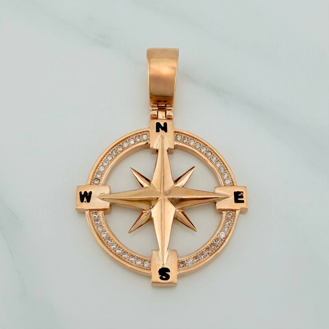 Dije Estrella Cardinal 7.65gr / 1 1/2 in / Oro Rosa 18K $