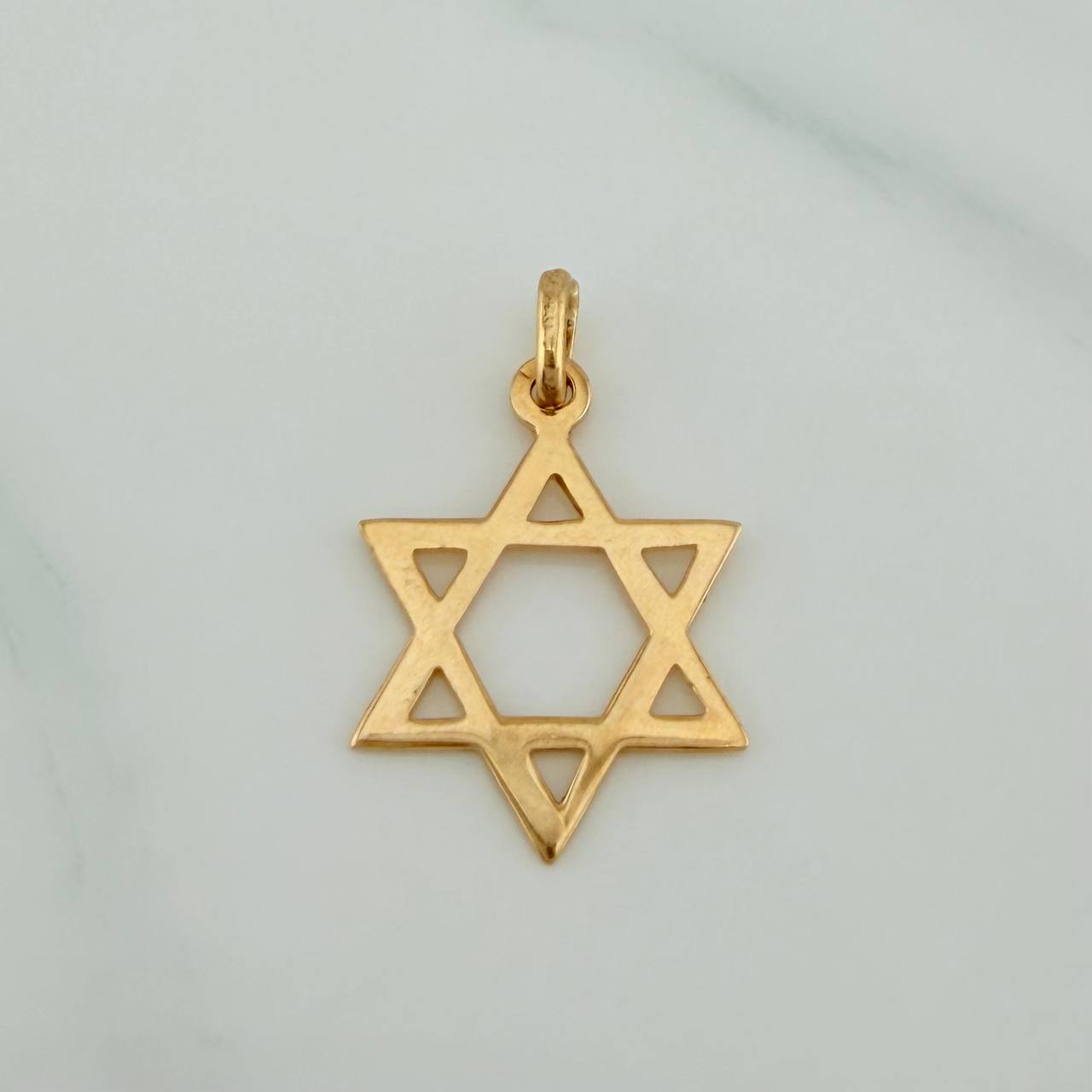 Dije Estrella De David 1.35gr / 1 in / Oro Amarillo 18K $