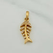 Dije Esqueleto Pez 1.9gr / 1 in / Oro Amarillo 18K $