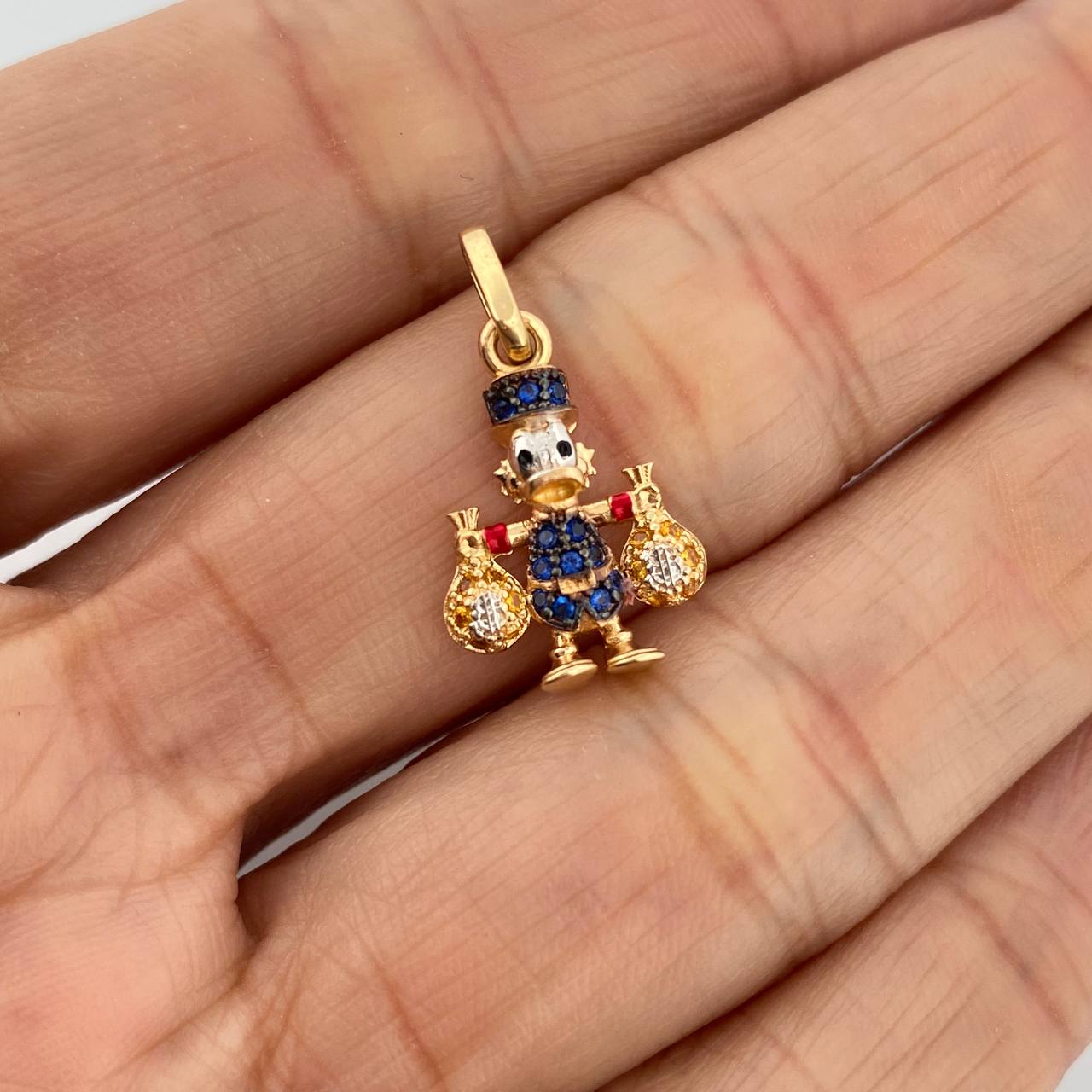 Dije Pato Bolsa Dinero 1.6gr / 3/4 in / Tres Oros 18K %