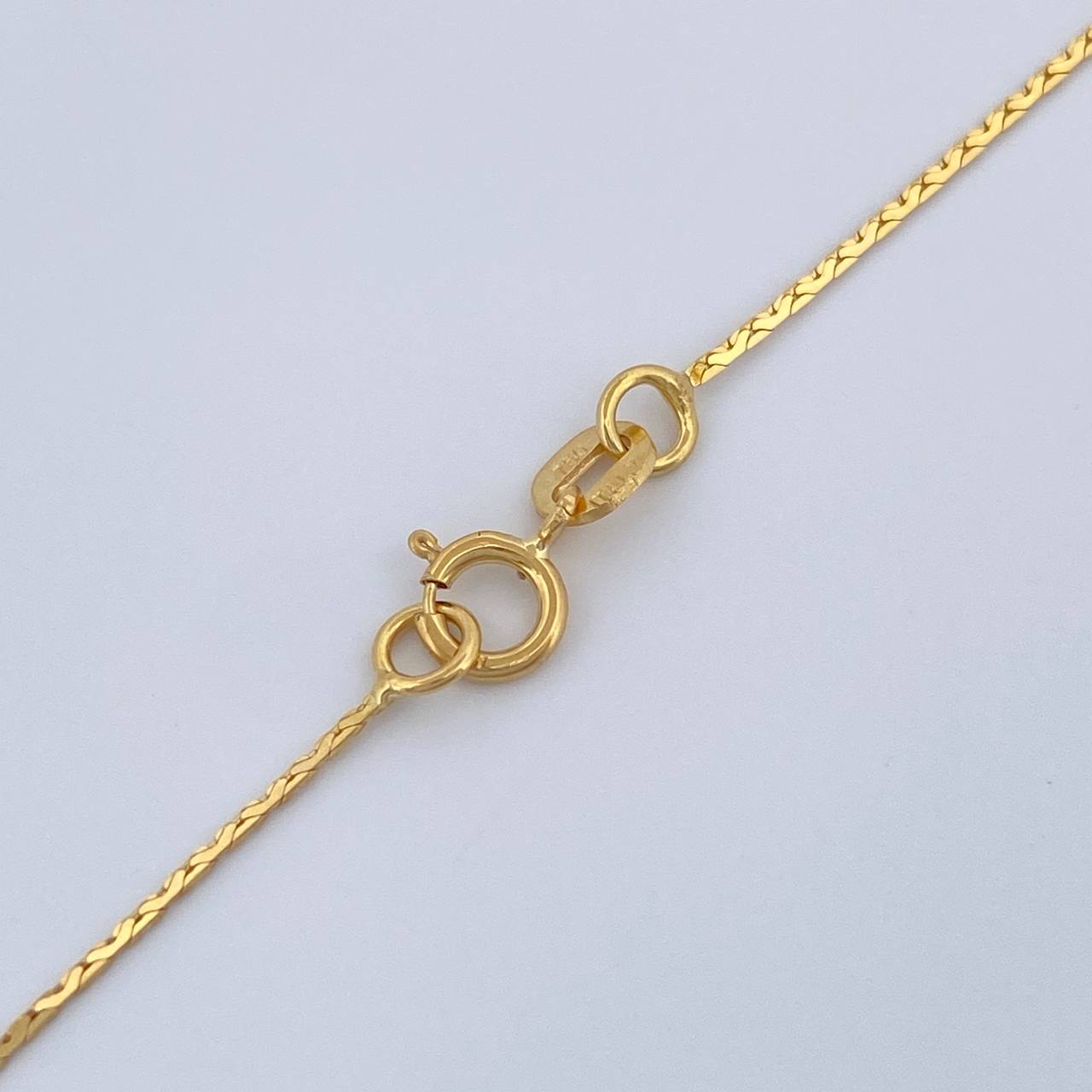 Cadena Serpiente 1.4gr / 17 3/4 in / 0.8mm Oro Amarillo +3 18K %