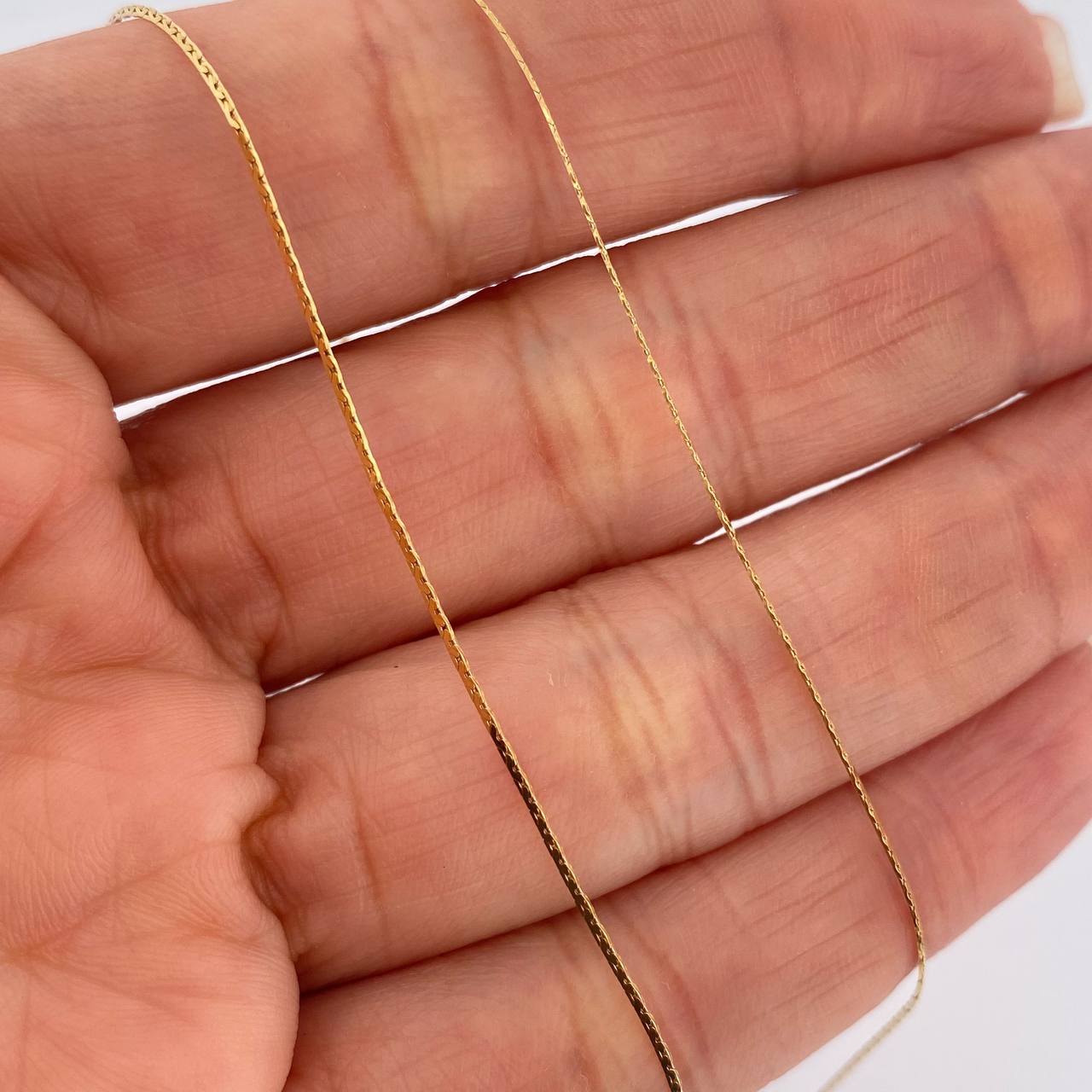 Cadena Serpiente 1.4gr / 17 3/4 in / 0.8mm Oro Amarillo +3 18K %