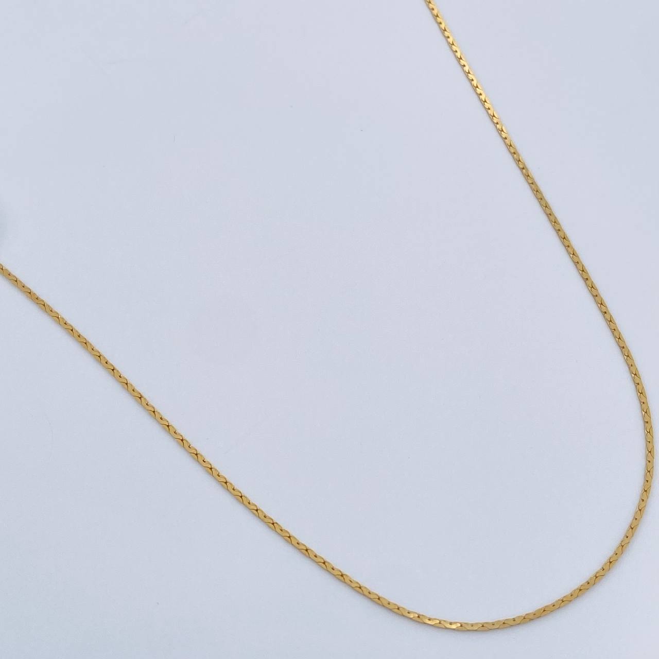 Cadena Serpiente 1.4gr / 17 3/4 in / 0.8mm Oro Amarillo +3 18K %