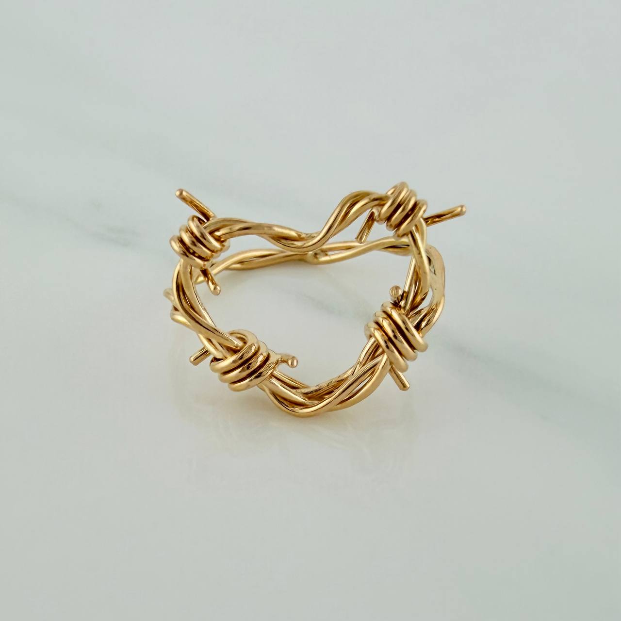 Anillo Corazon Alambrado 2.2gr / T3 1/2 / Oro Amarillo 18K $