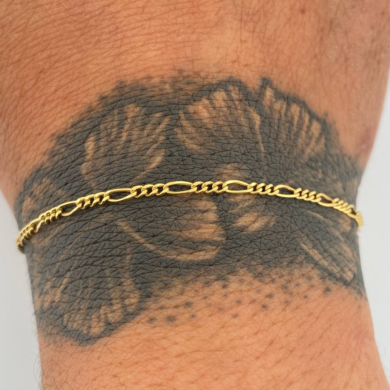 Pulso Figaro 0.9gr / 7 in / 1.8mm Oro Amarillo +1 18K $